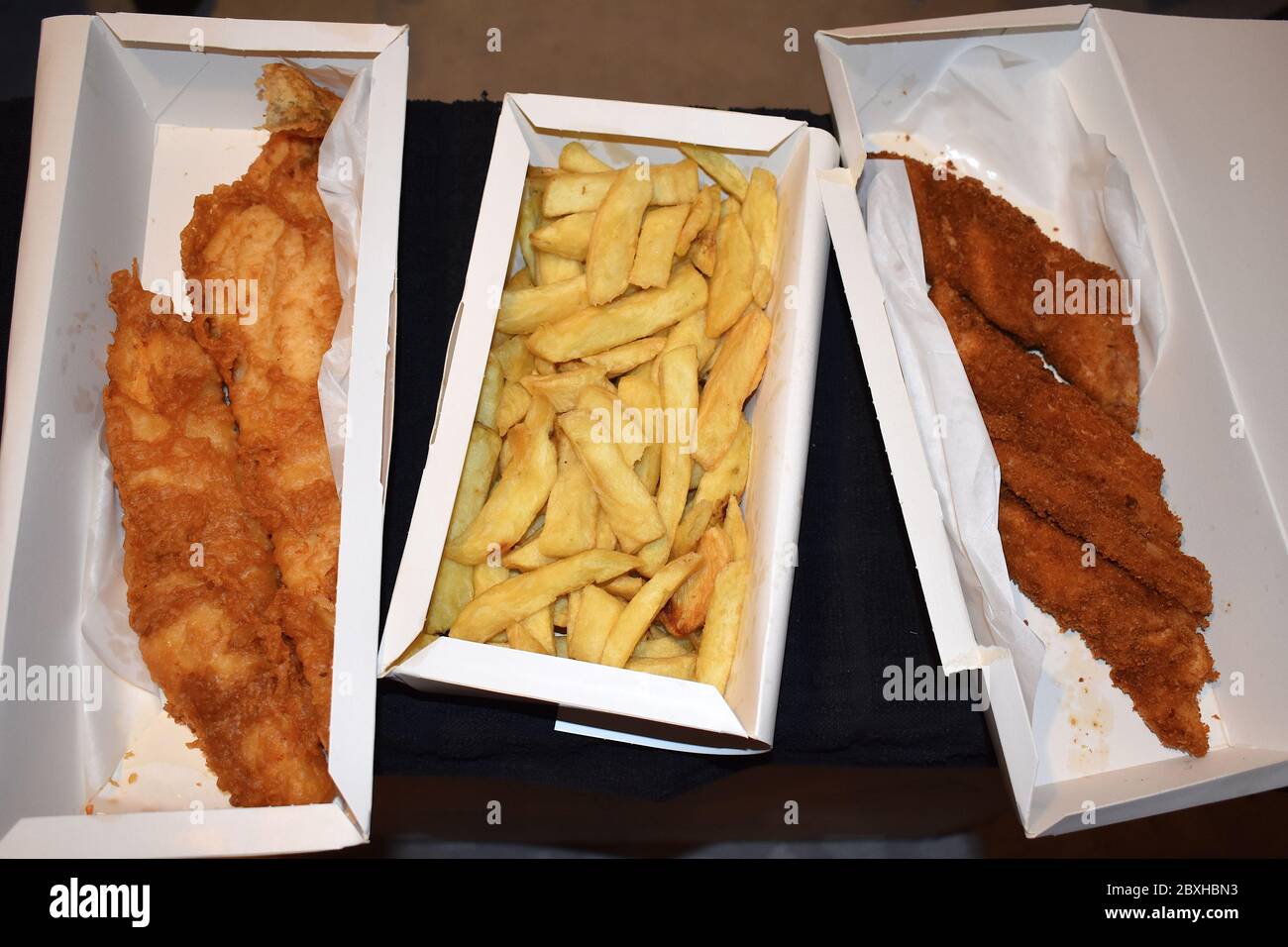 Fish and chips is common UK takeaway food Deep fried seafoods in batter with fries originated in