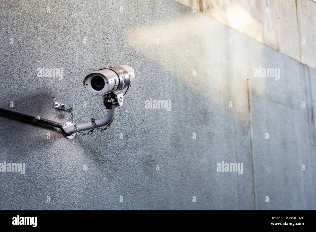 Security camera in public place. Surveillance and population control