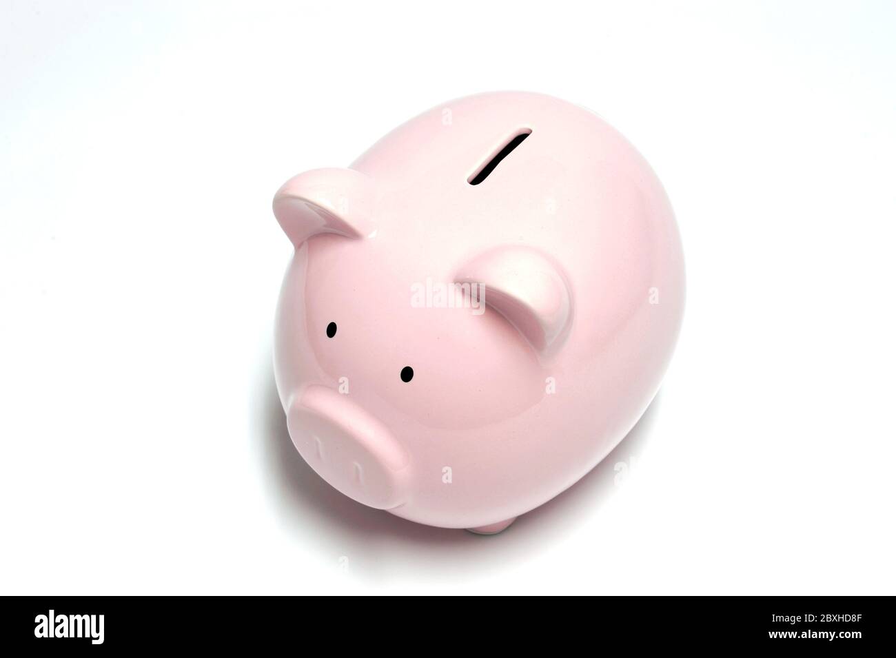 Pink piggy bank isolated on white background Stock Photo - Alamy