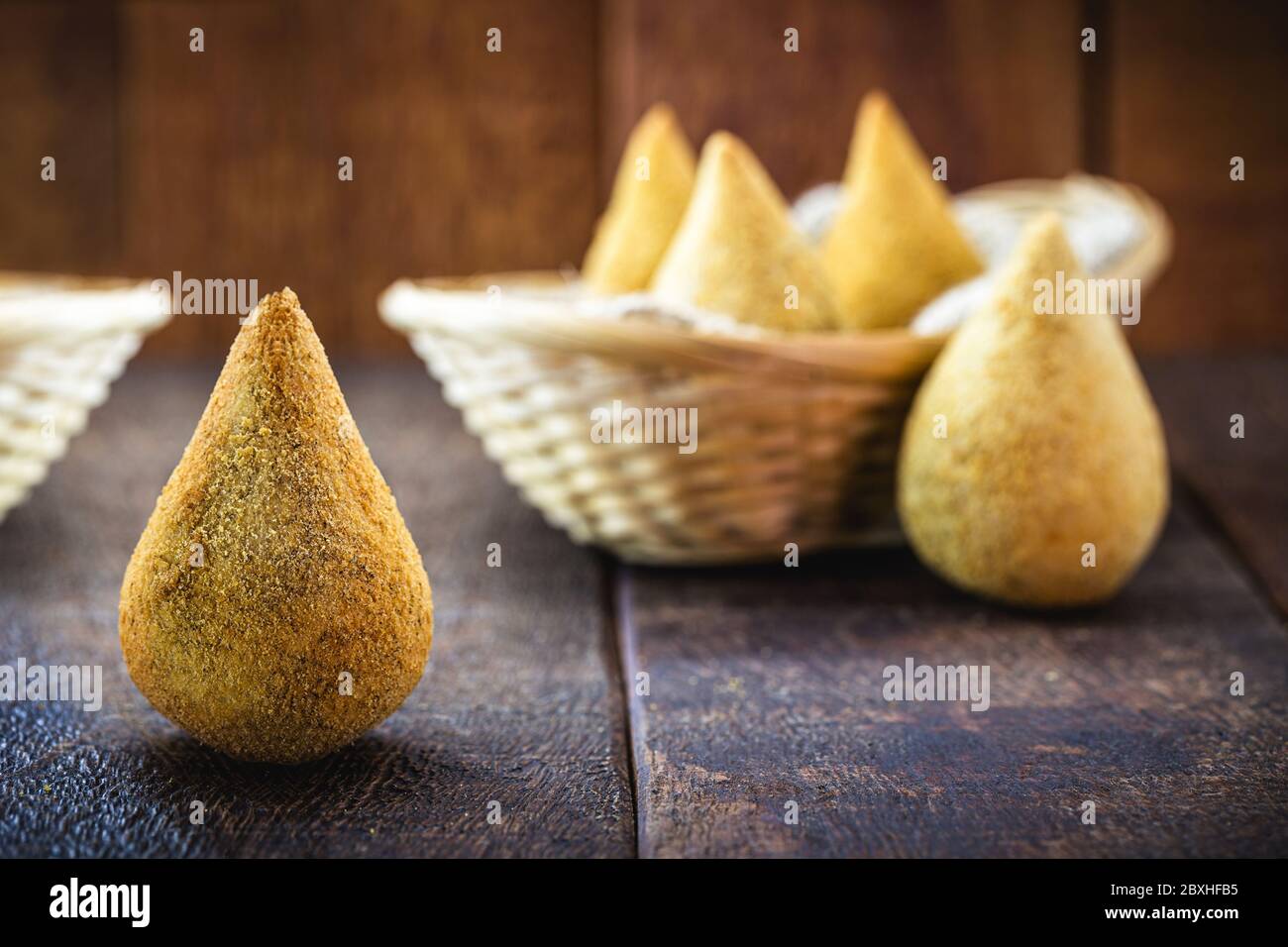 fried, unhealthy, homemade food. Fried and breaded chicken thigh