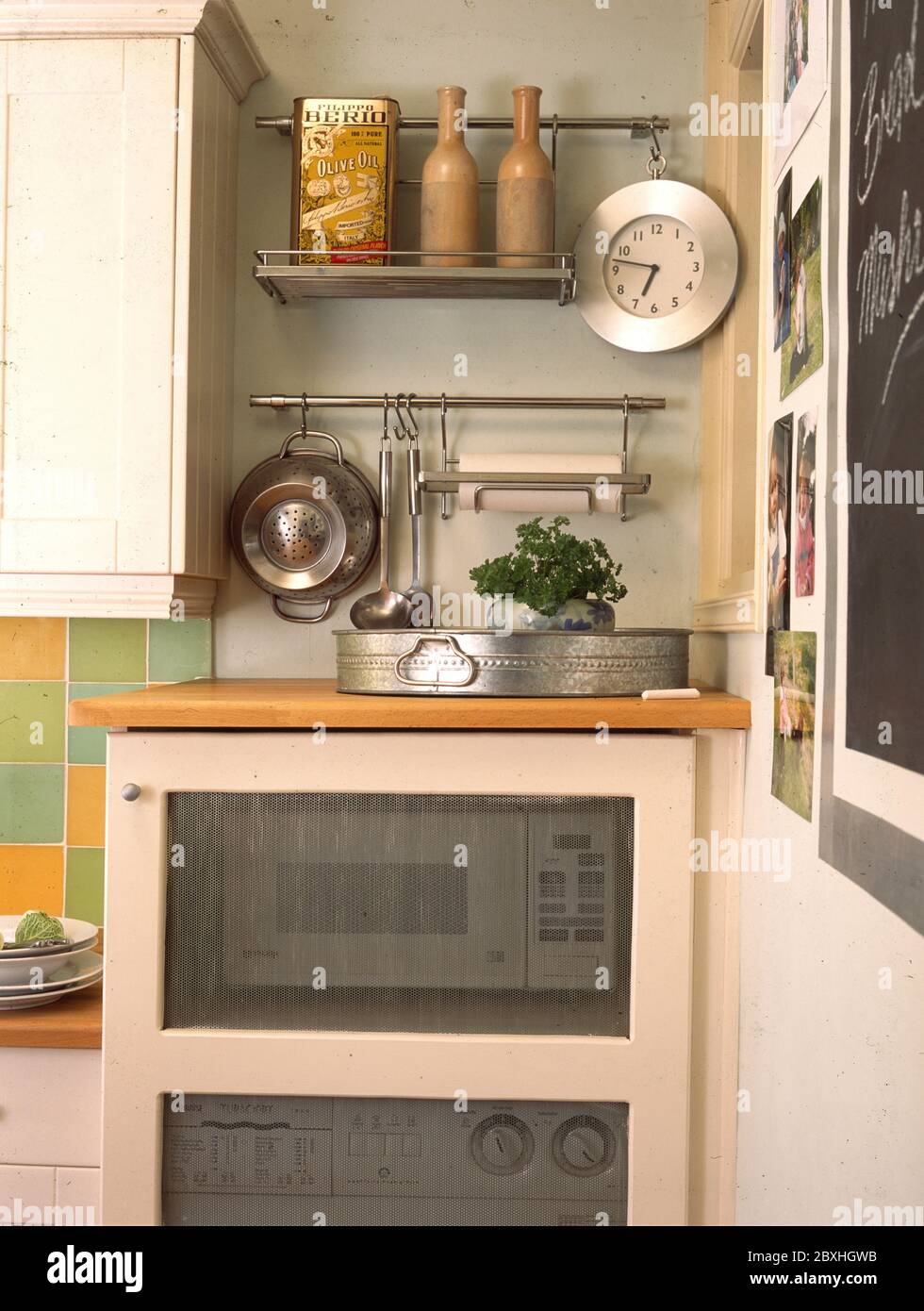 Closeup of kitchen corner with microwave and storage Stock Photo