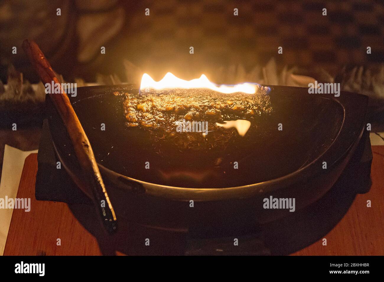 Lit oil lamp. In earlier times, the oil lamp was the only source of light  and heat in an Inuit home of sod or ice Stock Photo - Alamy