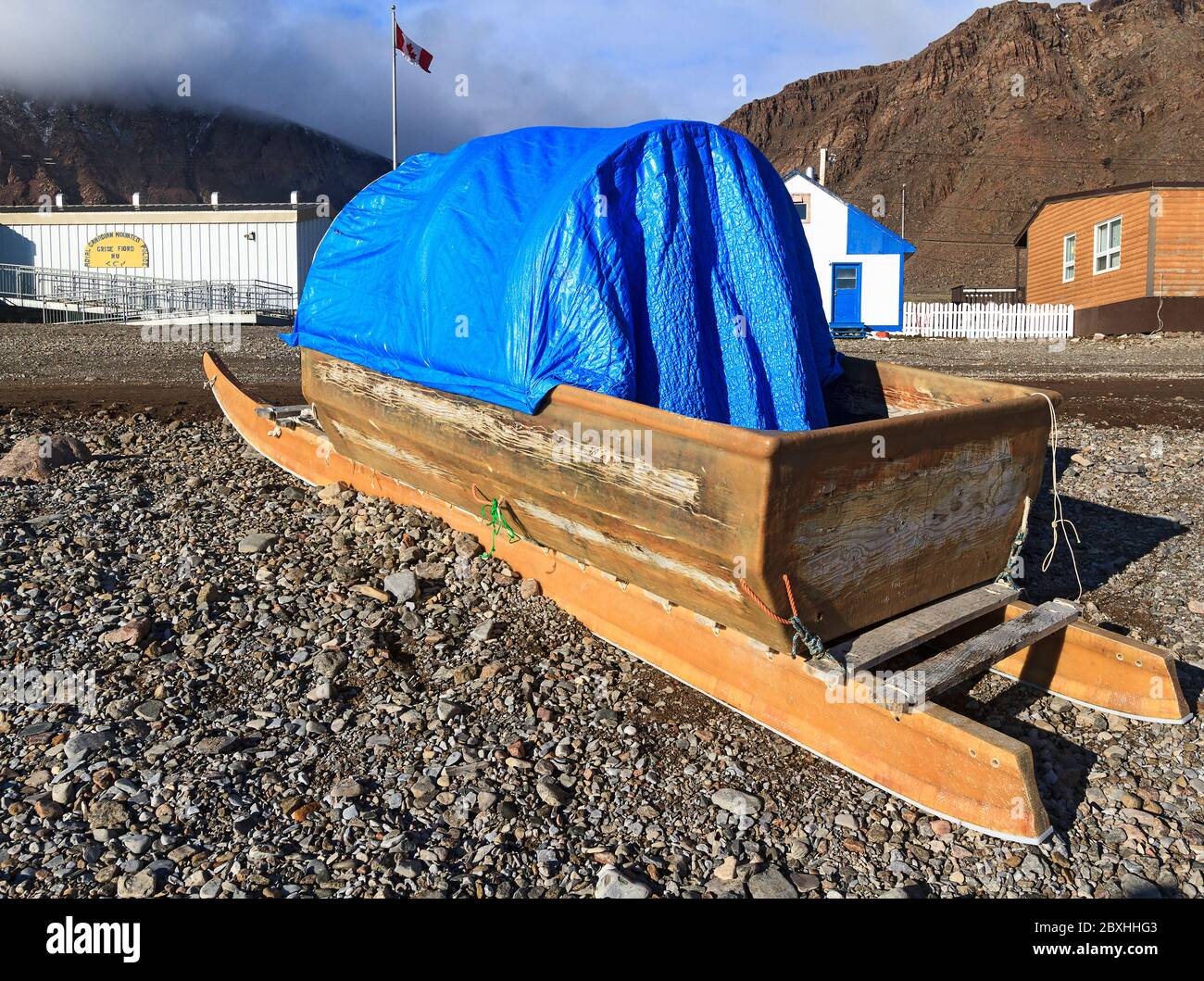 Cargo sled (komatik) in sitting on the beach in Grise Fjord on Ellesmere Island, Canada's northernmost community, made up virtually all of Inuit peopl Stock Photo