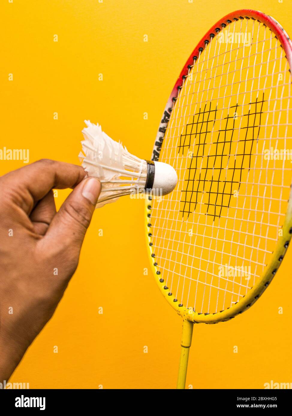Badminton racket and White Feather Shuttlecock with a colour green ...