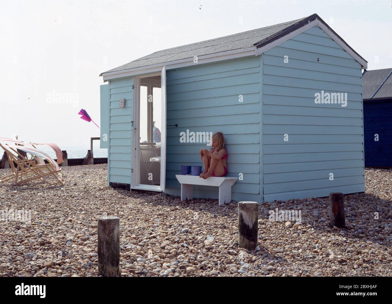 Beach hut finished with blue paint Stock Photo Alamy