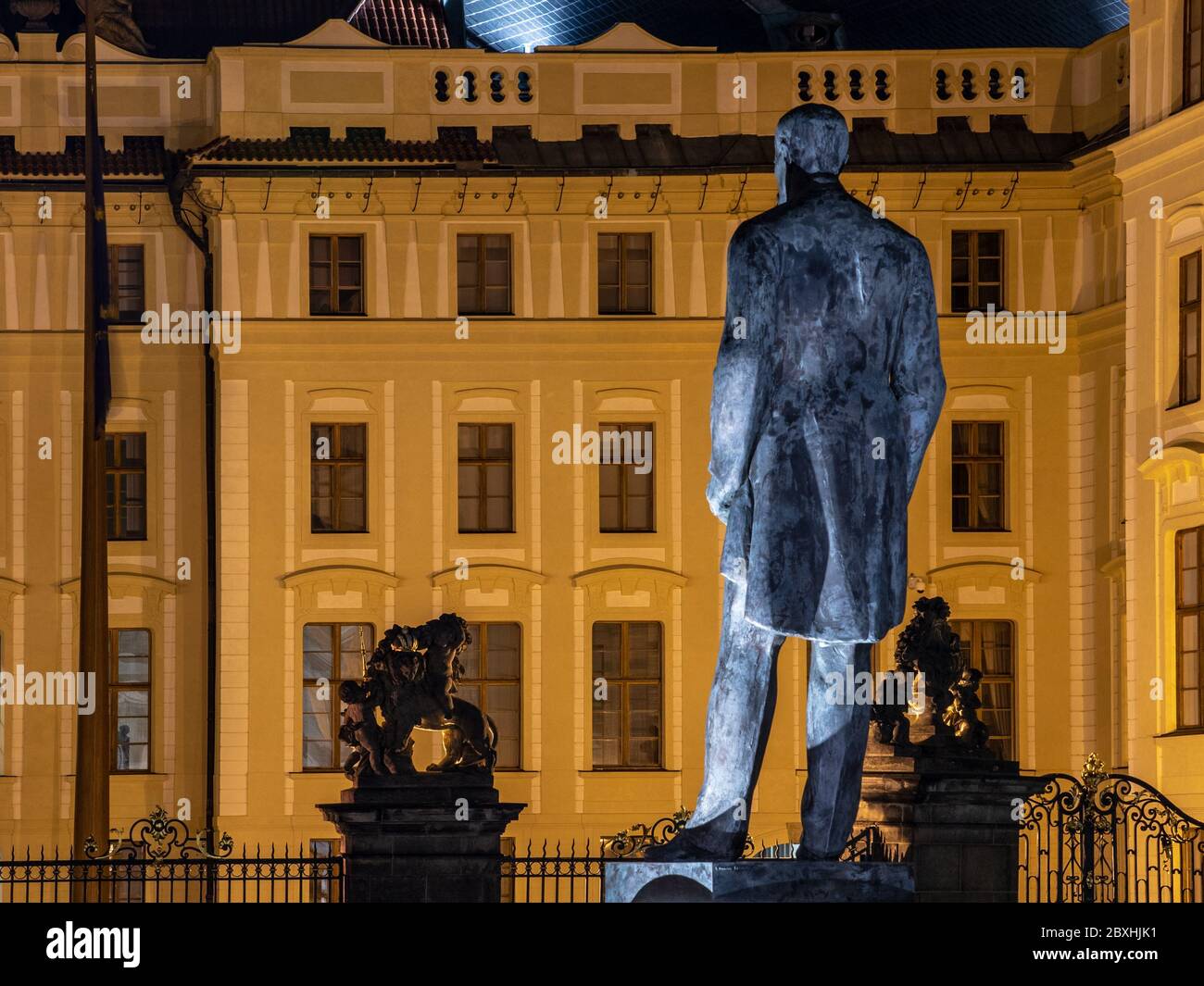 PRAGUE, CZECH REPUBLIC - OCTOBER 11, 2018: The first president of Czechoslovakia - Tomas Garrigue Masayk, alias TGM, statue at Hradcanske square near Prague Castle, Prague, Czech Republic. View from back side by night. Stock Photo