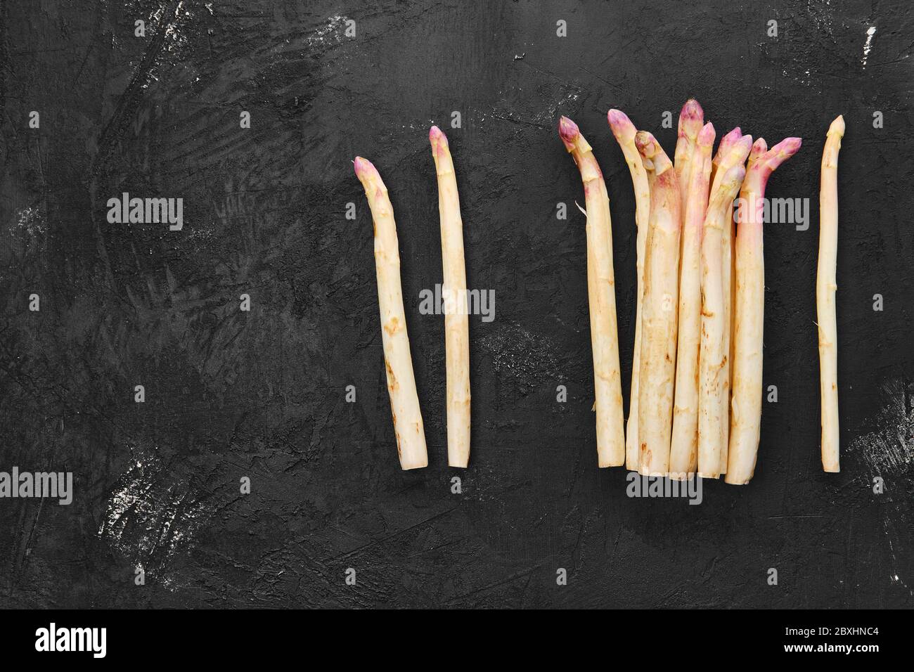 Bunch of asparagus stalks on black background Stock Photo