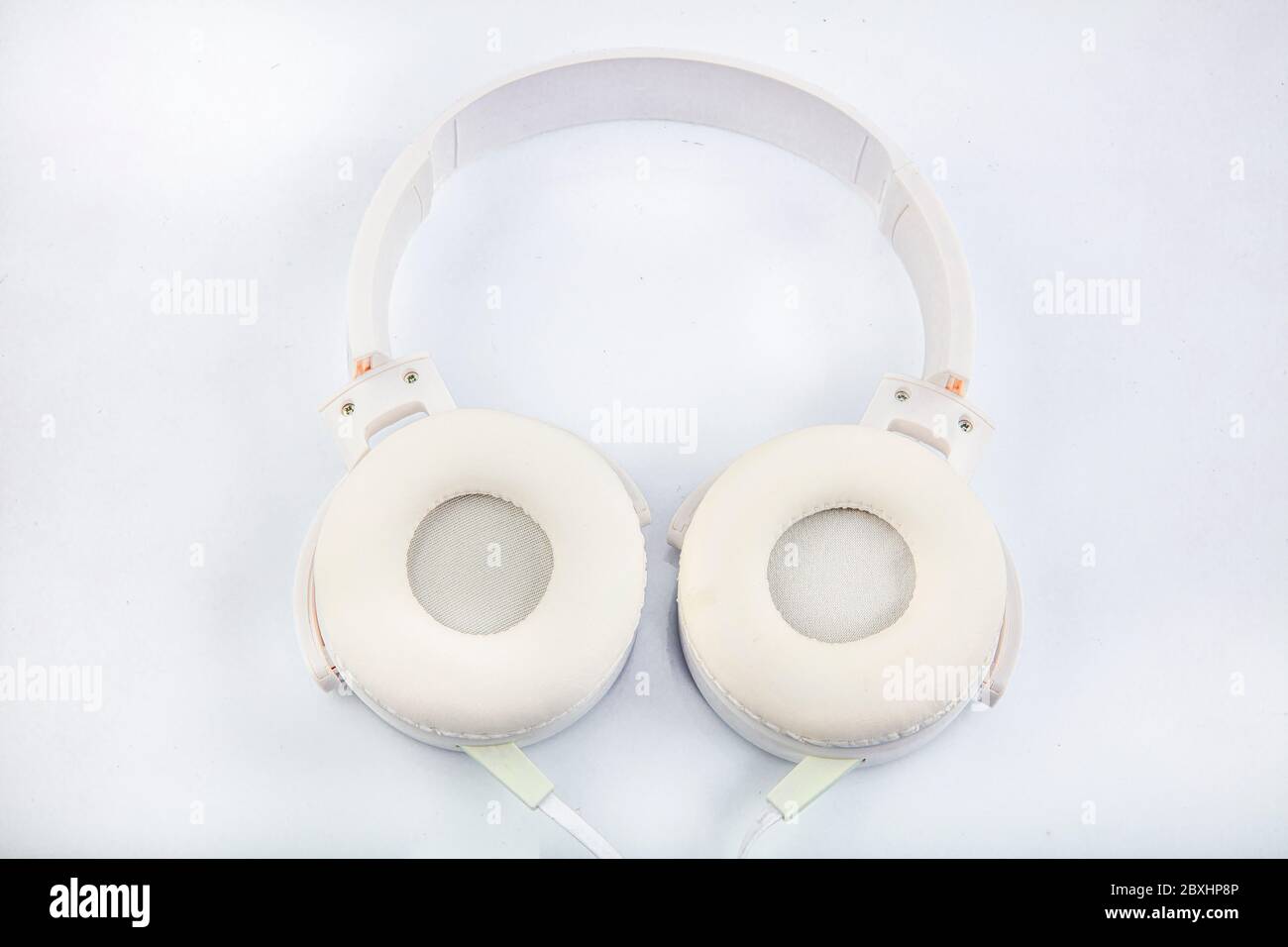 Stereo headphones. Top view of white headphones on white background ...