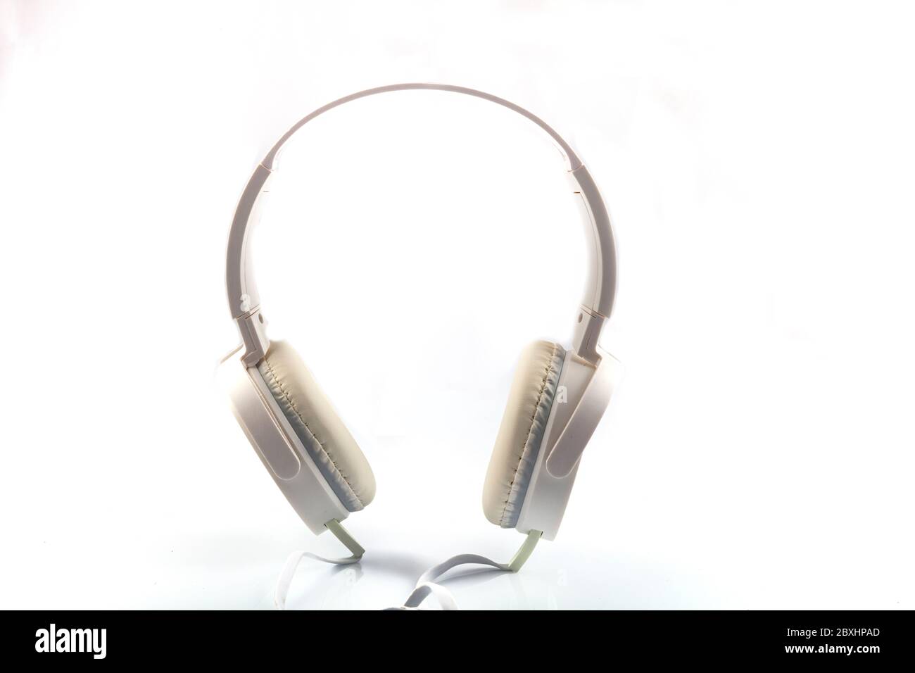 Stereo headphones. Top view of white headphones on white background ...
