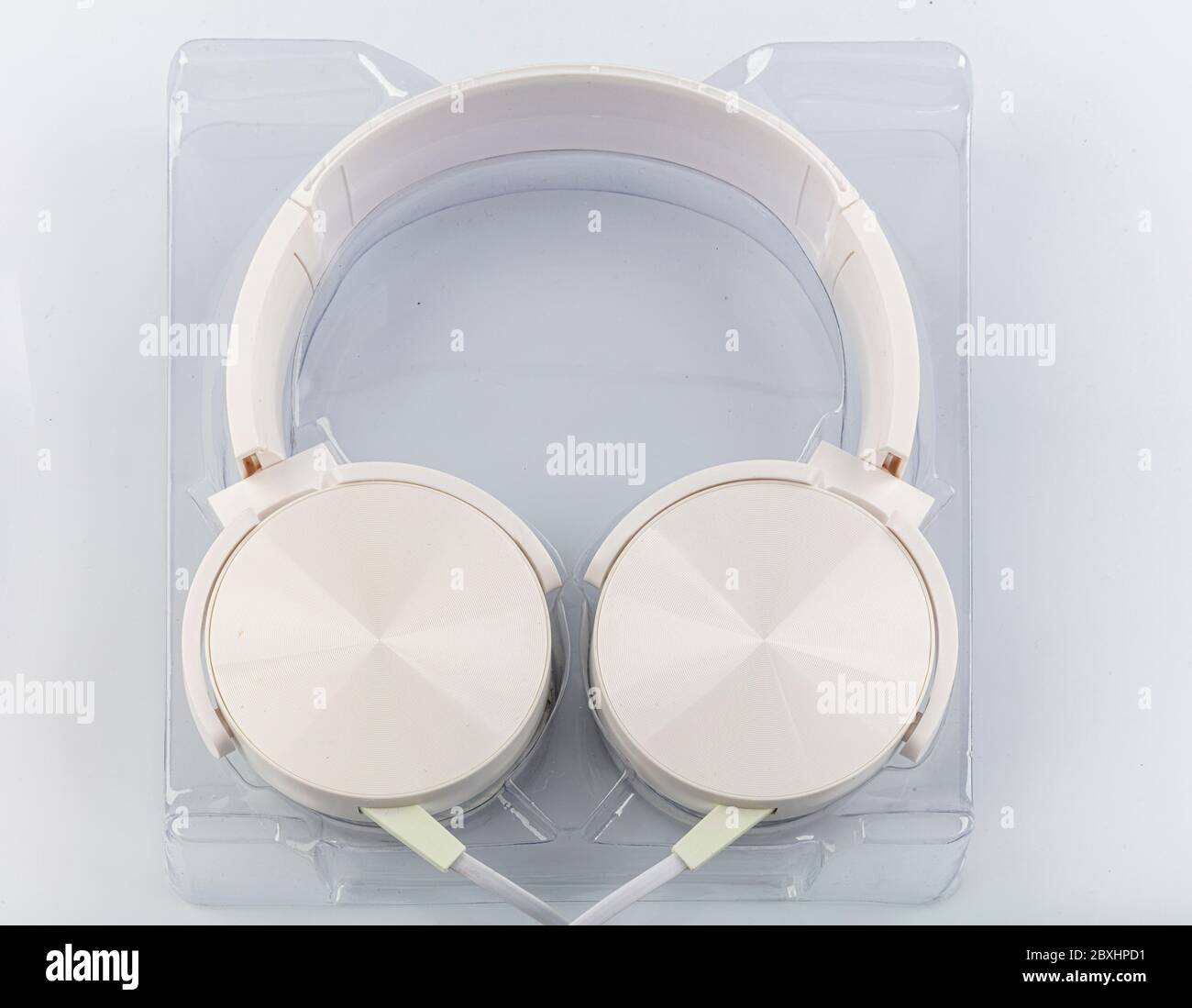 Stereo headphones. Top view of white headphones on white background ...
