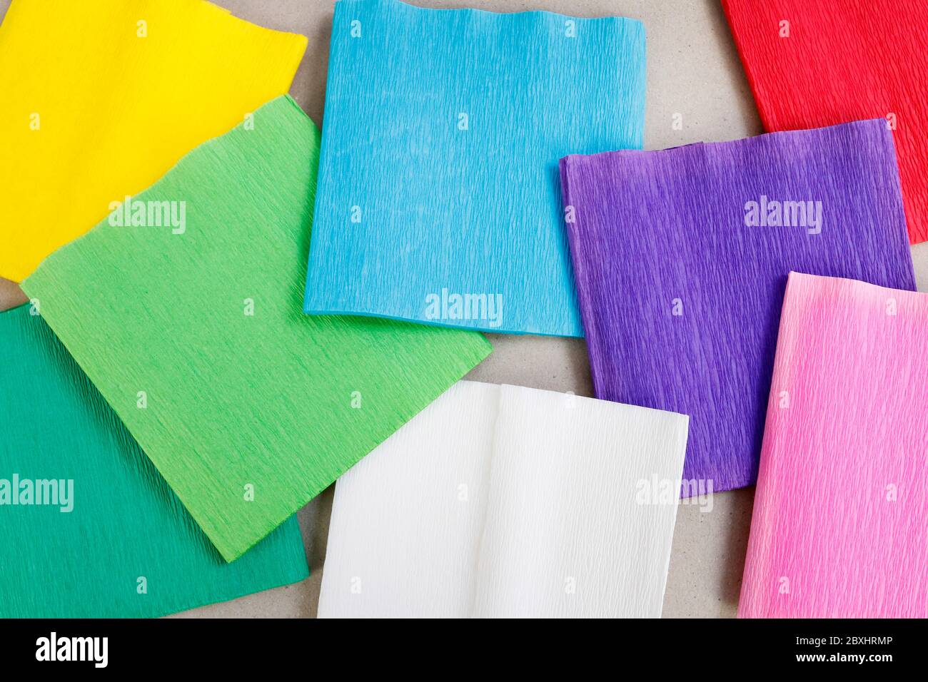 Squares cut from paper. Multicolored  background. Graphic resources Stock Photo