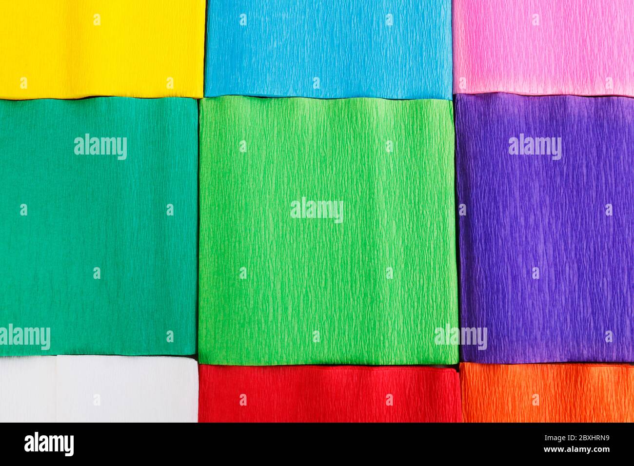 Squares cut from paper. Multicolored  background. Graphic resources Stock Photo
