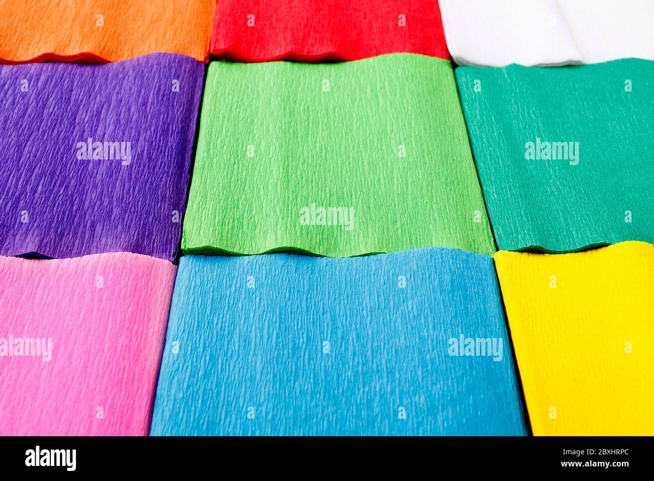 Squares cut from paper. Multicolored  background. Graphic resources Stock Photo