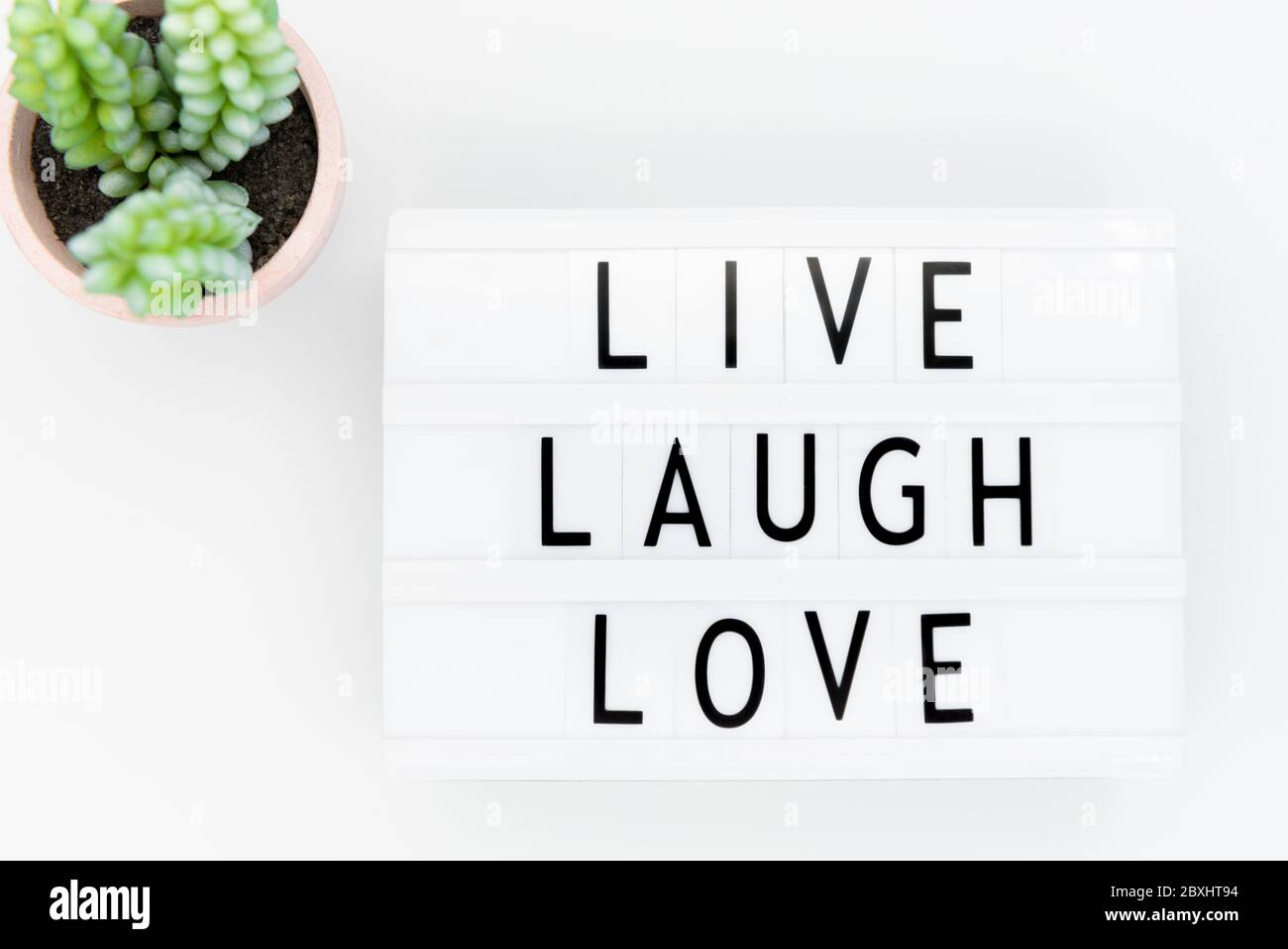 Live laugh love inspirational message on mountain landscape Stock Photo   Alamy