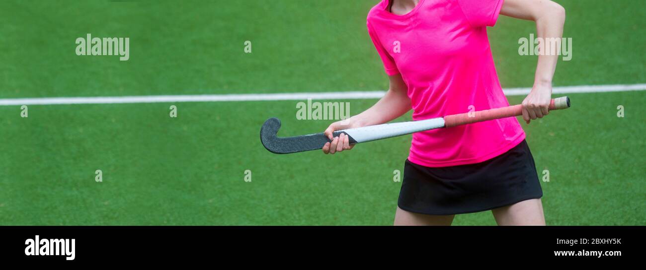 A beautiful young woman field hockey player Stock Photo Alamy