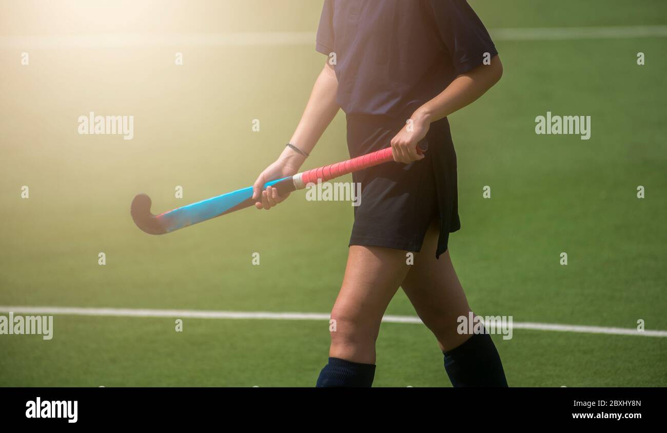 A beautiful young woman field hockey player Stock Photo Alamy