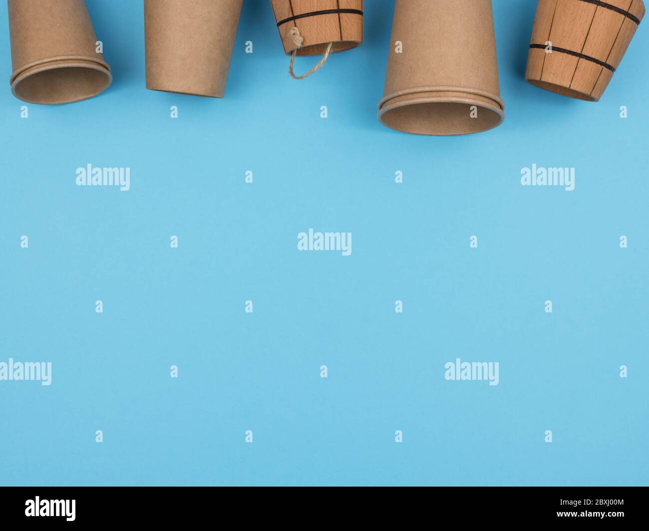 Kitchen accessories from ecological materials on a blue background. Stock Photo