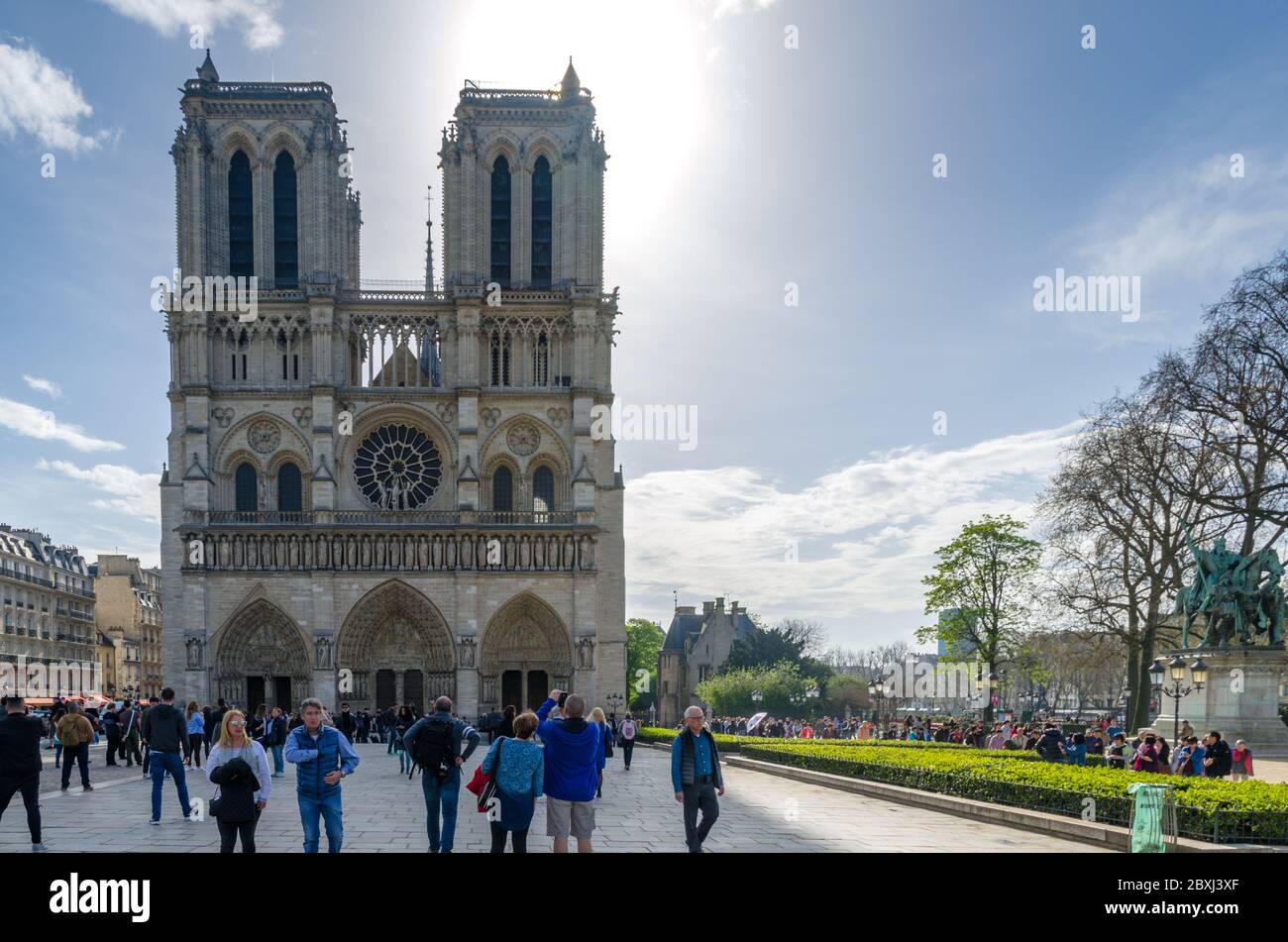 Tourists at Notre-Dame de Paris, France Stock Photo