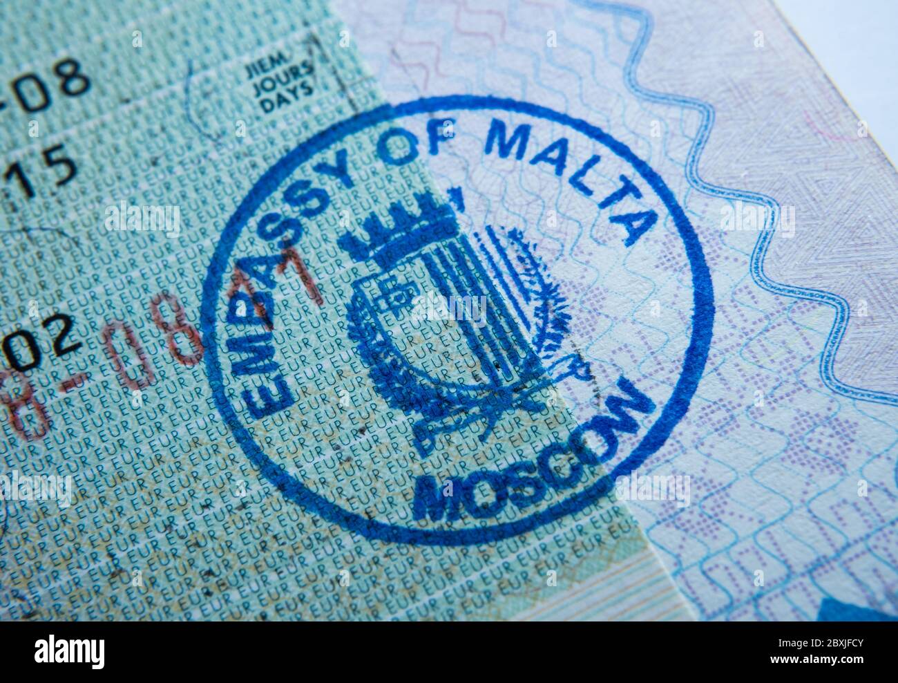 Stamp of the embassy of Malta in passport. Made by immigration officer at Maltese  embassy in Moscow. Selective focus. Macro photo Stock Photo - Alamy