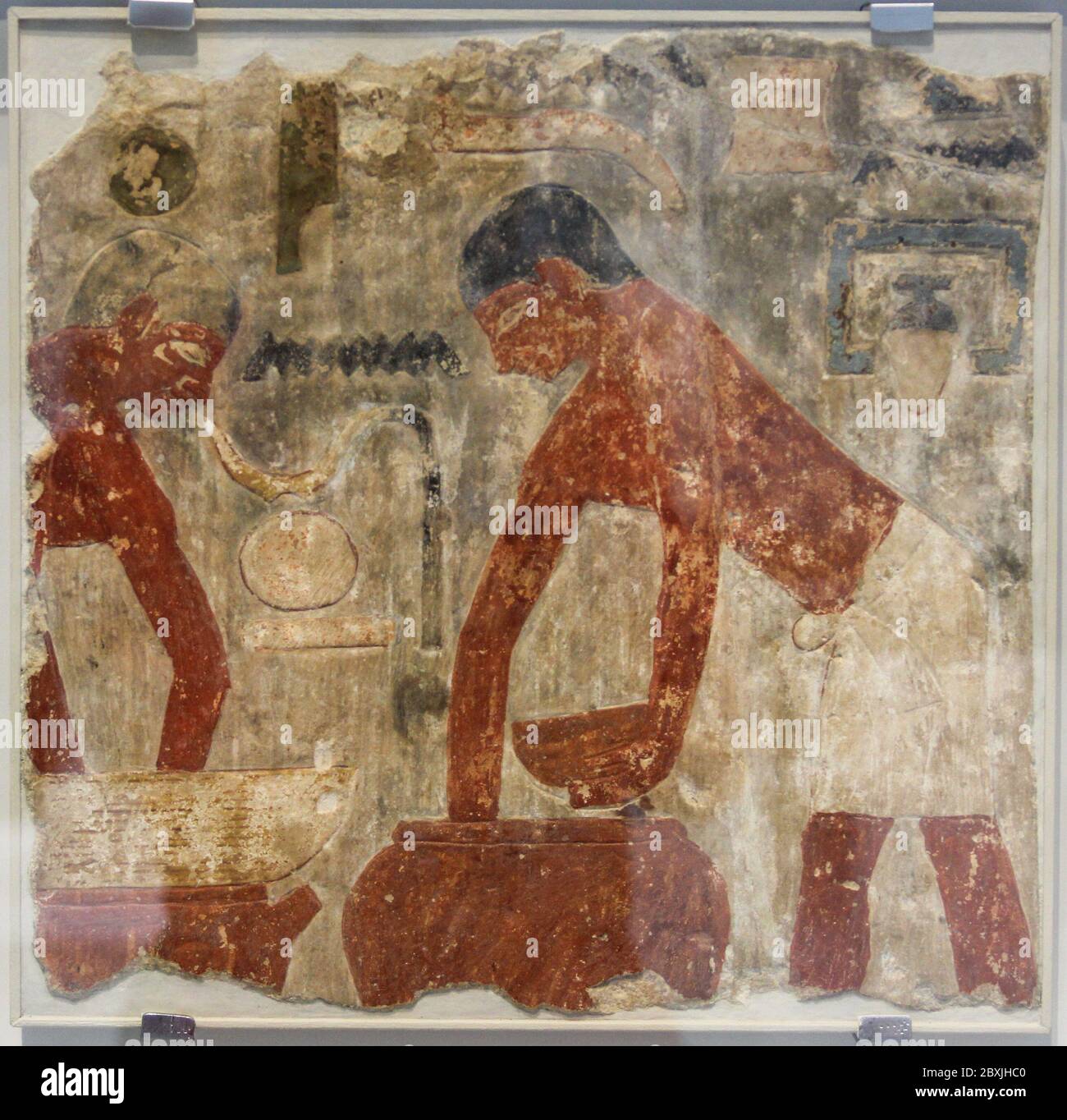 Brewing scene: decoration from a funerary chapel. Painted limestone. 2500-2350 BC. Egypt. Stock Photo