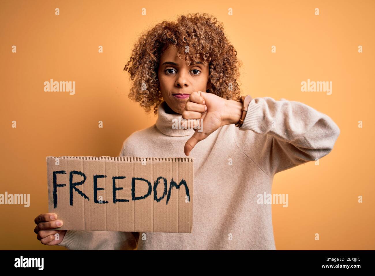 African american activist woman asking for liberty holding banner with ...