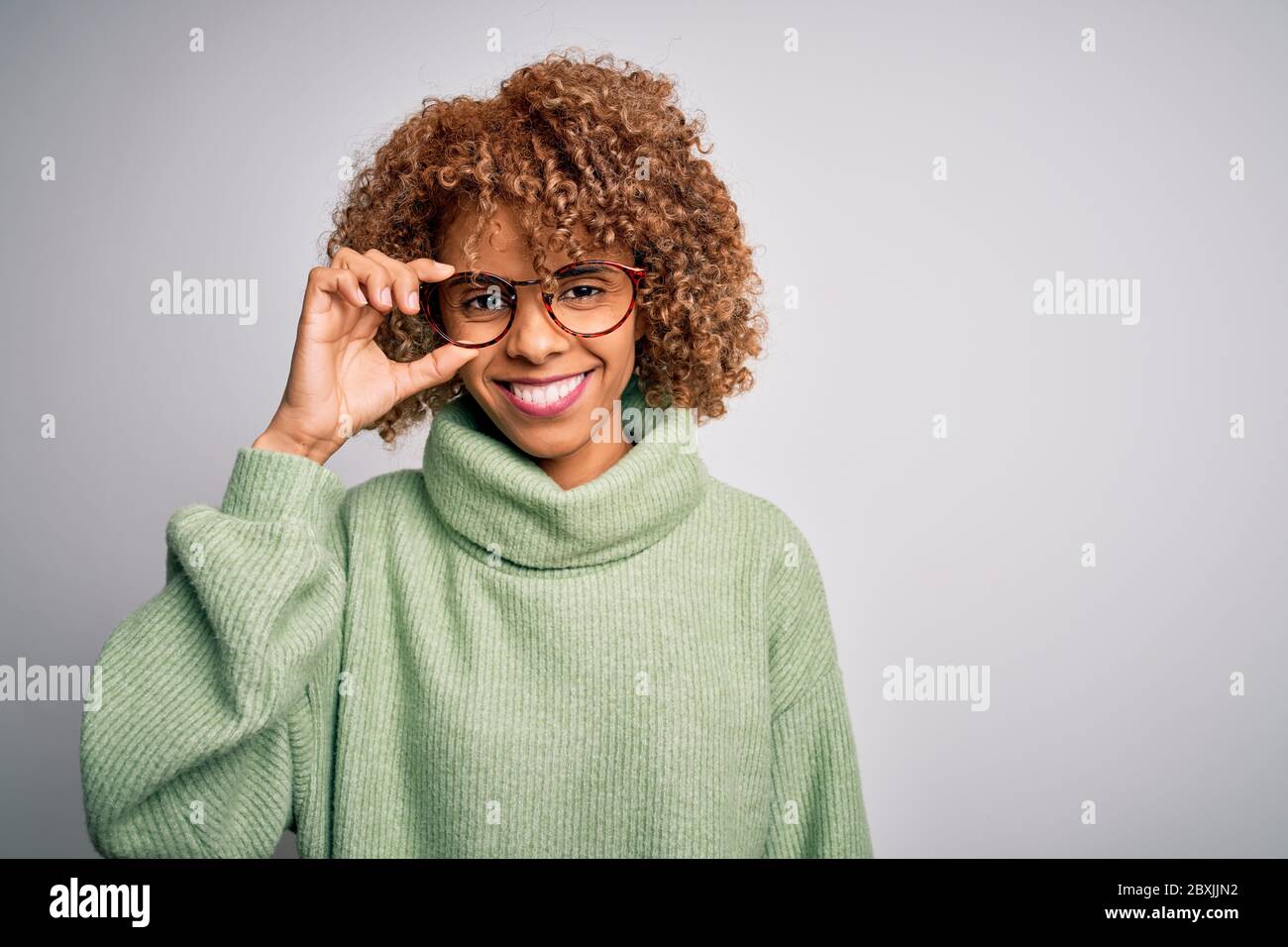 African american optical woman with curly hair wearing glasses over ...