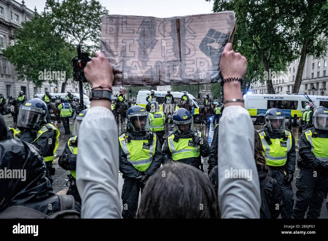 Thousands of Black Lives Matter (BLM) activists and supporters gather in Westminster, London to protest the death of George Floyd in the US. Stock Photo