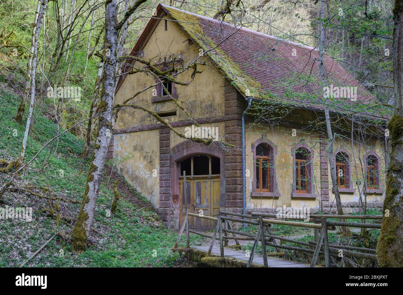 The former turbine house of the castle mill in the Gauchach gorge was built in 1904. The castle mill is one of the oldest mills in the Löffingen distr Stock Photo
