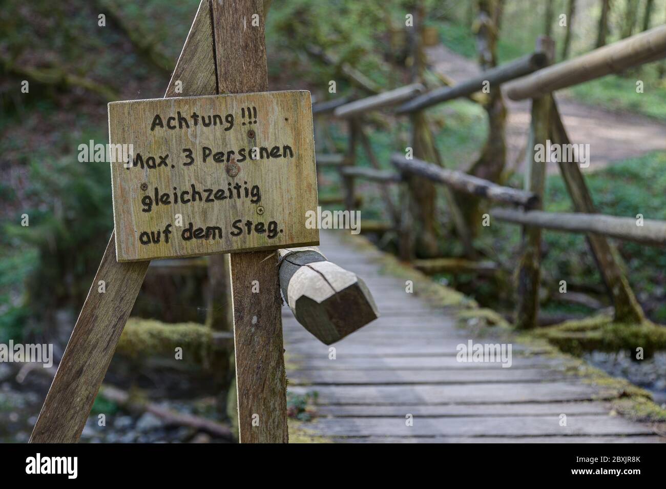 Wooden walkway in the Gauchach Gorge. Stock Photo
