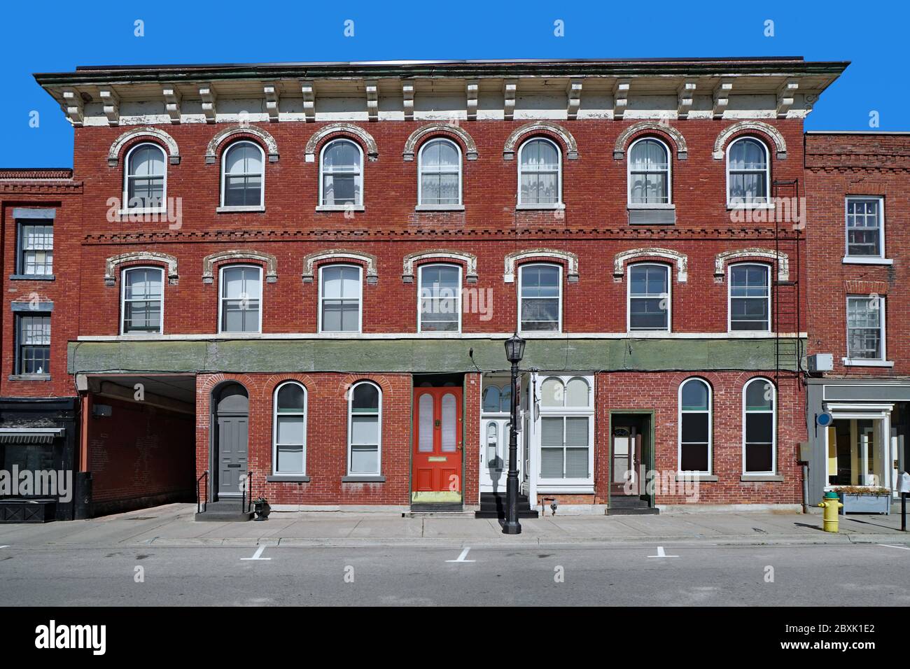 small old brick apartment building Stock Photo