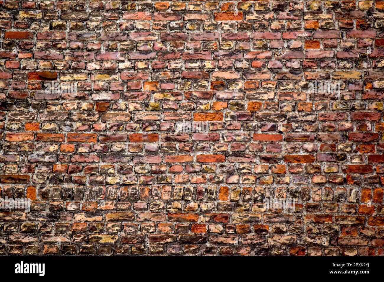 Old grunge brick wall as a background Stock Photo - Alamy