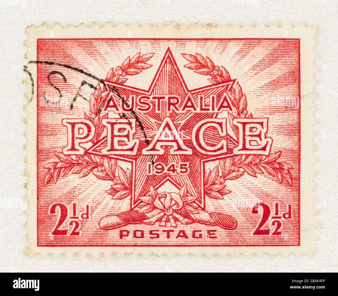 SEATTLE WASHINGTON - June 1, 2020:  Australian stamp commemorating the end of WW II in 1945, with official creast featuring wreath with star and Peace Stock Photo