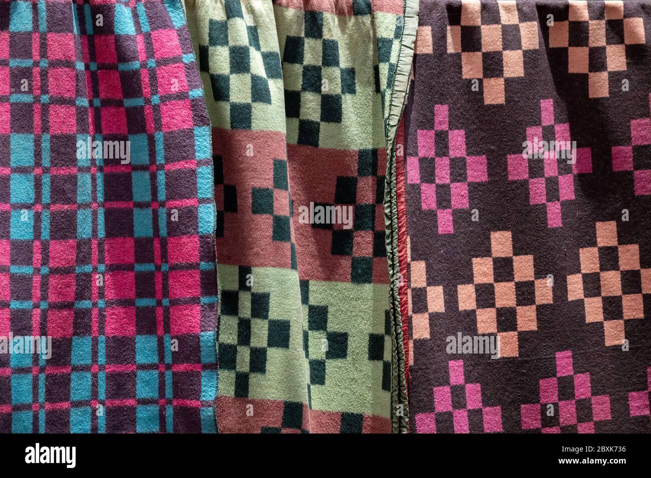 Colorful blankets hanging on a line to dry. Image taken in Nairobi, Kenya. Stock Photo