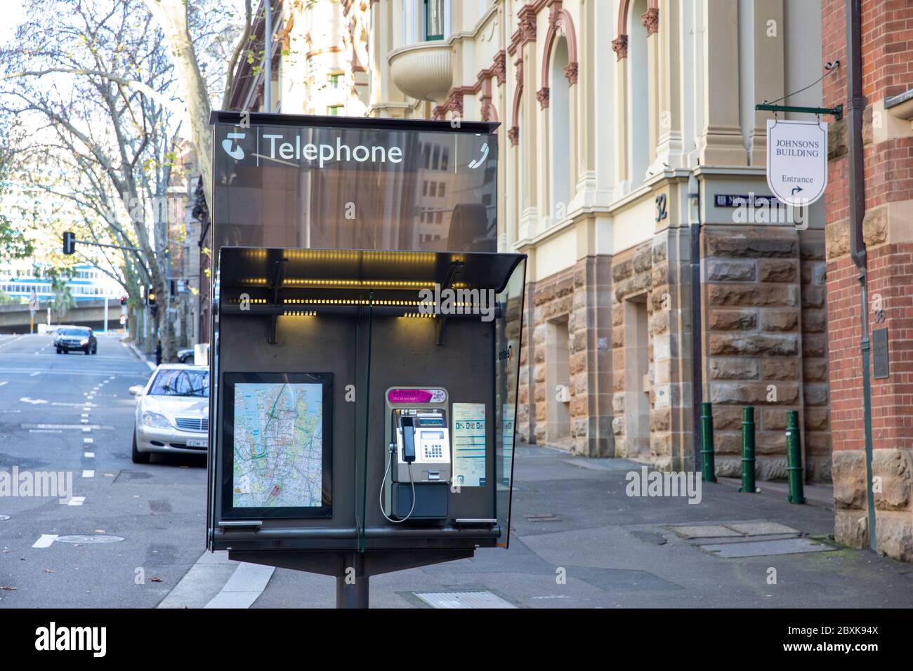 Telstra public telephone booth in Sydney city centre,NSW,Australia Stock Photo