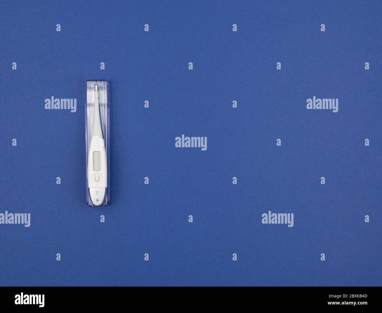 Digital thermometer on blue background hi-res stock photography and ...