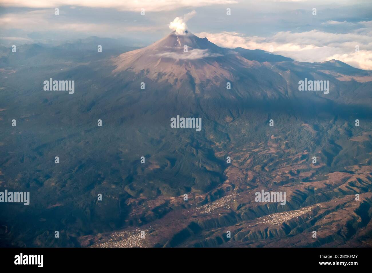 Popocatepetl volcano with settlements at base Mexico Stock Photo