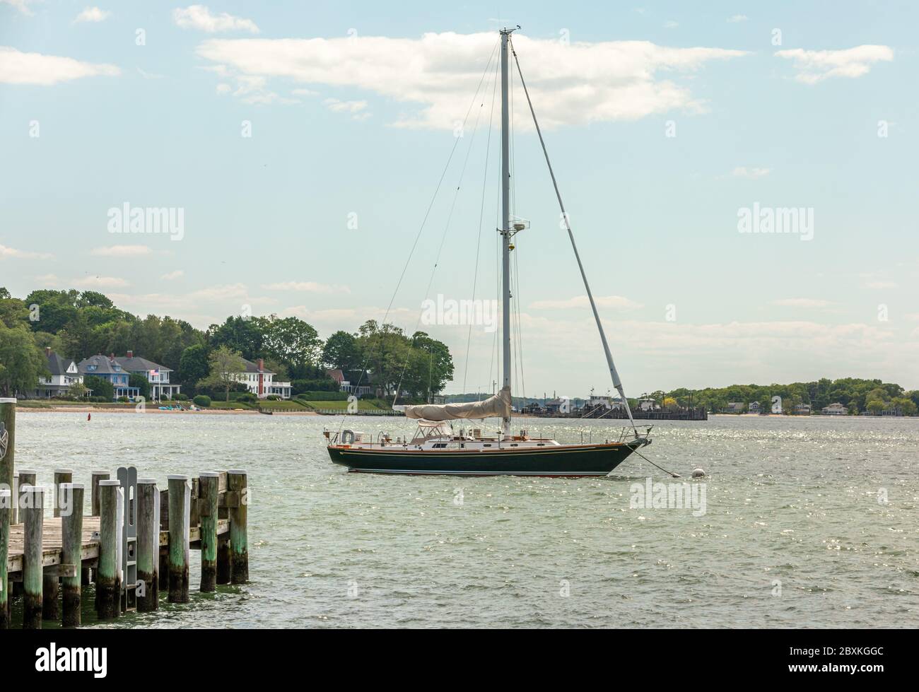 Large sail boat on a mooring in Dering Harbor, Shelter Island, NY Stock Photo
