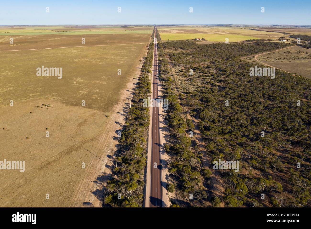 Aerial view of the long straight road that is the Eyre Highway in South Australia Stock Photo