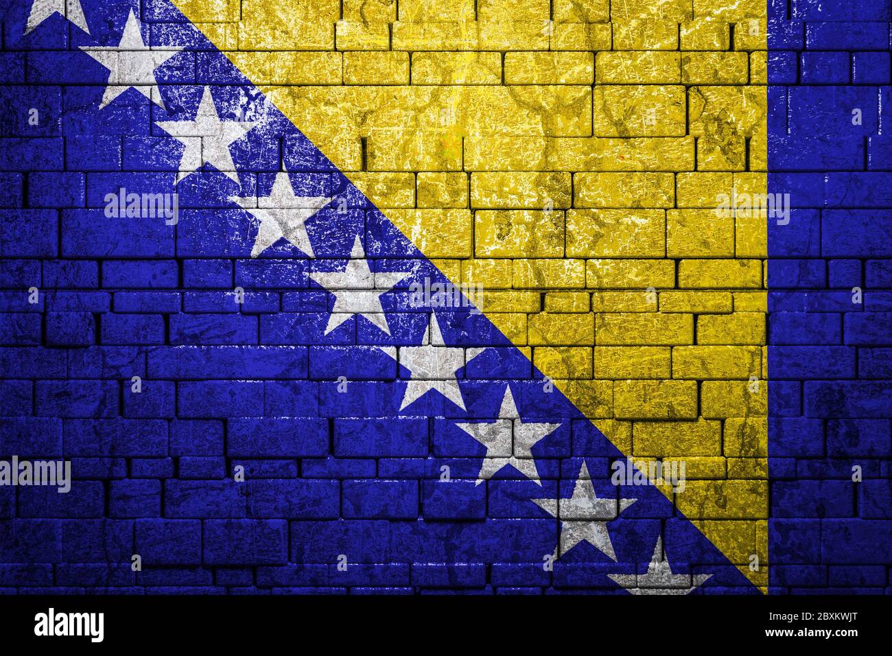 National flag of Bosnia Herzegovina on brick wall background.The ...