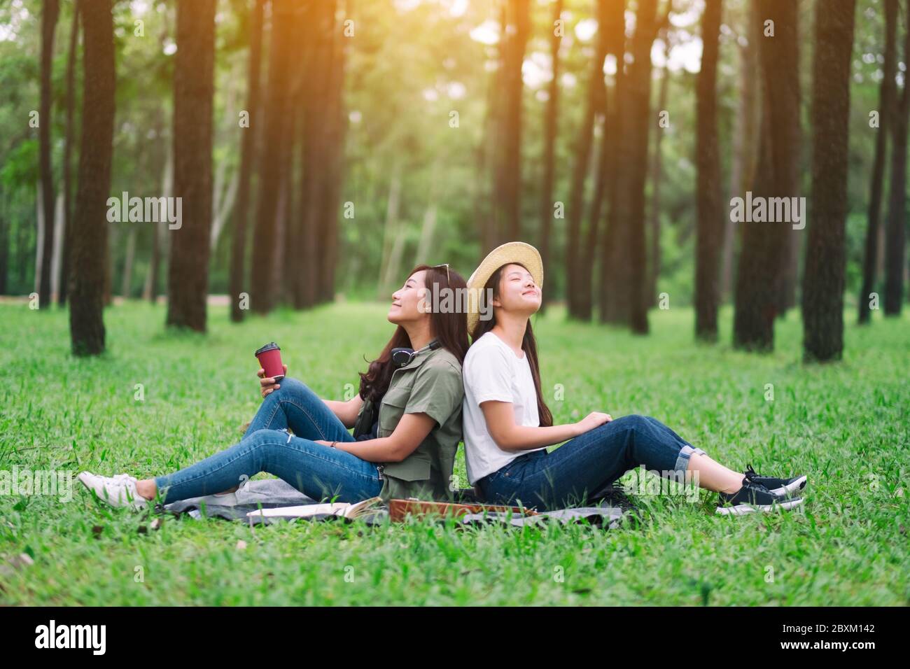 Two Attractive Young Women In The Woods High Resolution Stock ...