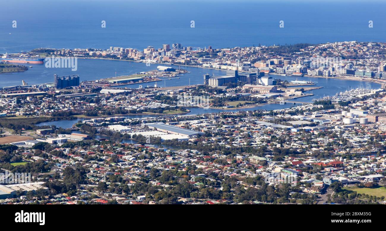 An aerial view of Newcastle City showing the harbour and river area and the suburbs of