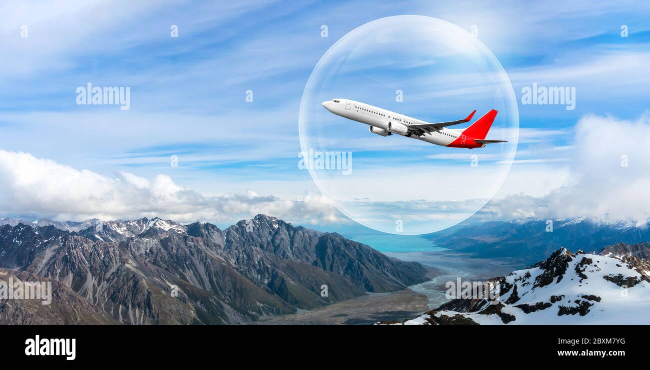 Travel bubble concept - Airplane traveling in bubble representing international travel bubble project to revive tourism and hotel industry among count Stock Photo
