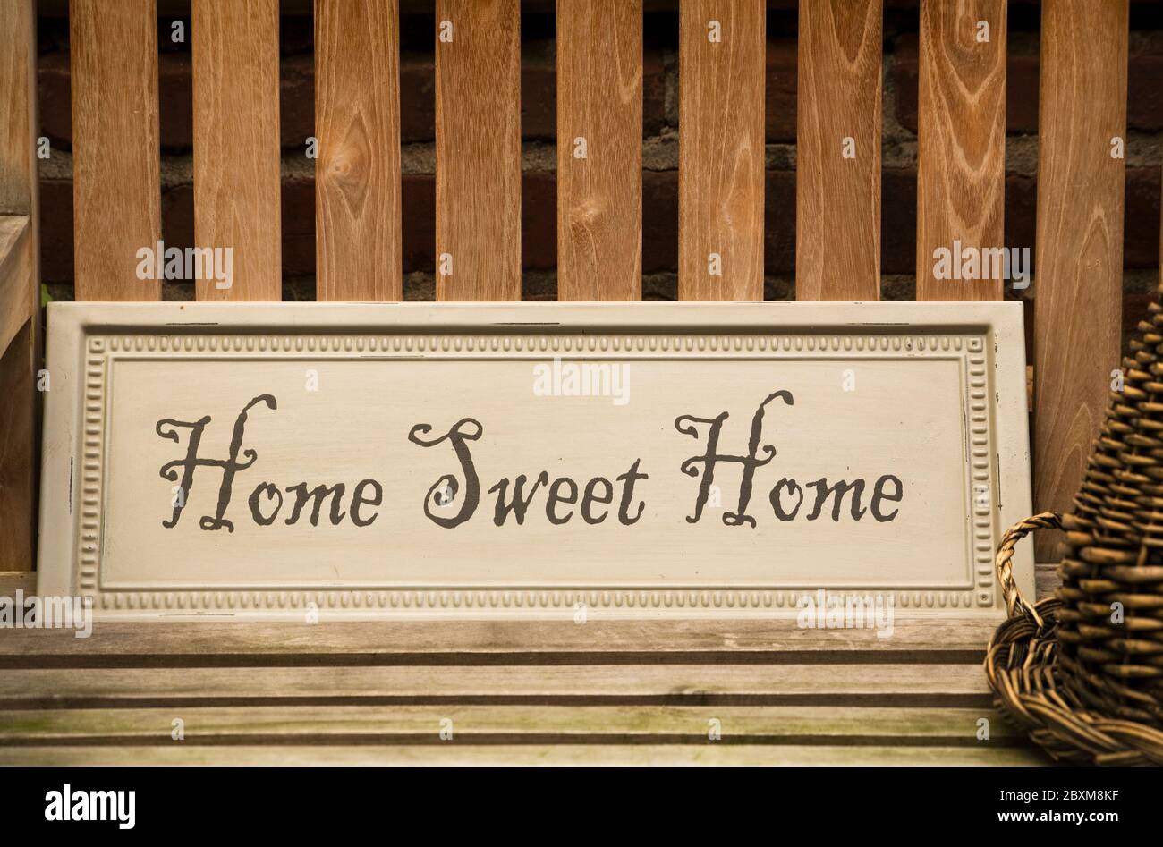 sign saying "Home Sweet Home" at flea market stand Stock Photo