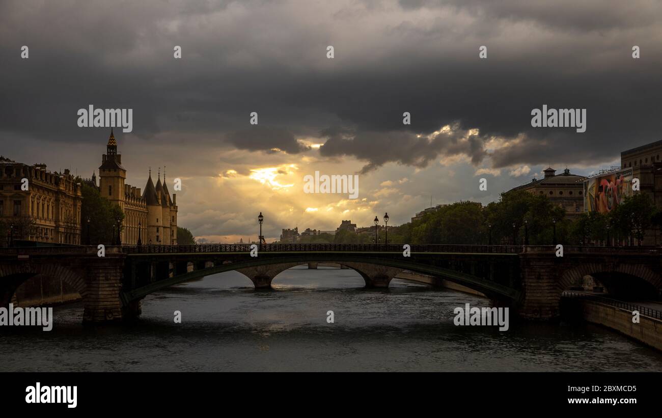 Paris, France - April 28, 2020: Panoramic view of the Conciergerie, the Hotel Dieu and the bridges over the Seine during the containment measures due Stock Photo