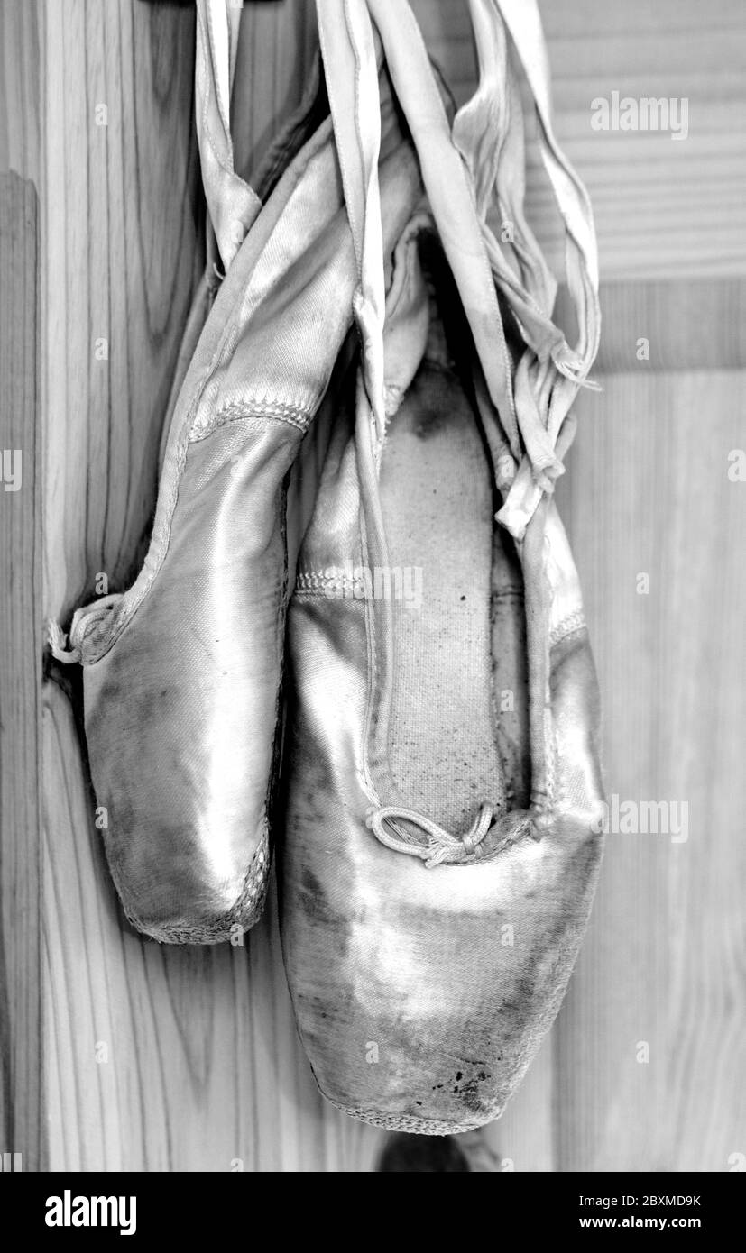 Old ballet shoes in black & white Stock Photo