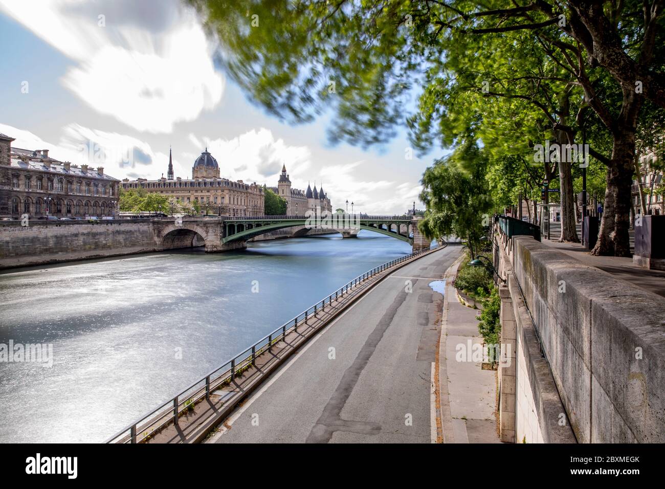 Paris, France - May 1, 2020: View of the Conciergerie, the Hotel Dieu and the bridges over the Seine during the containment measures due to the corona Stock Photo