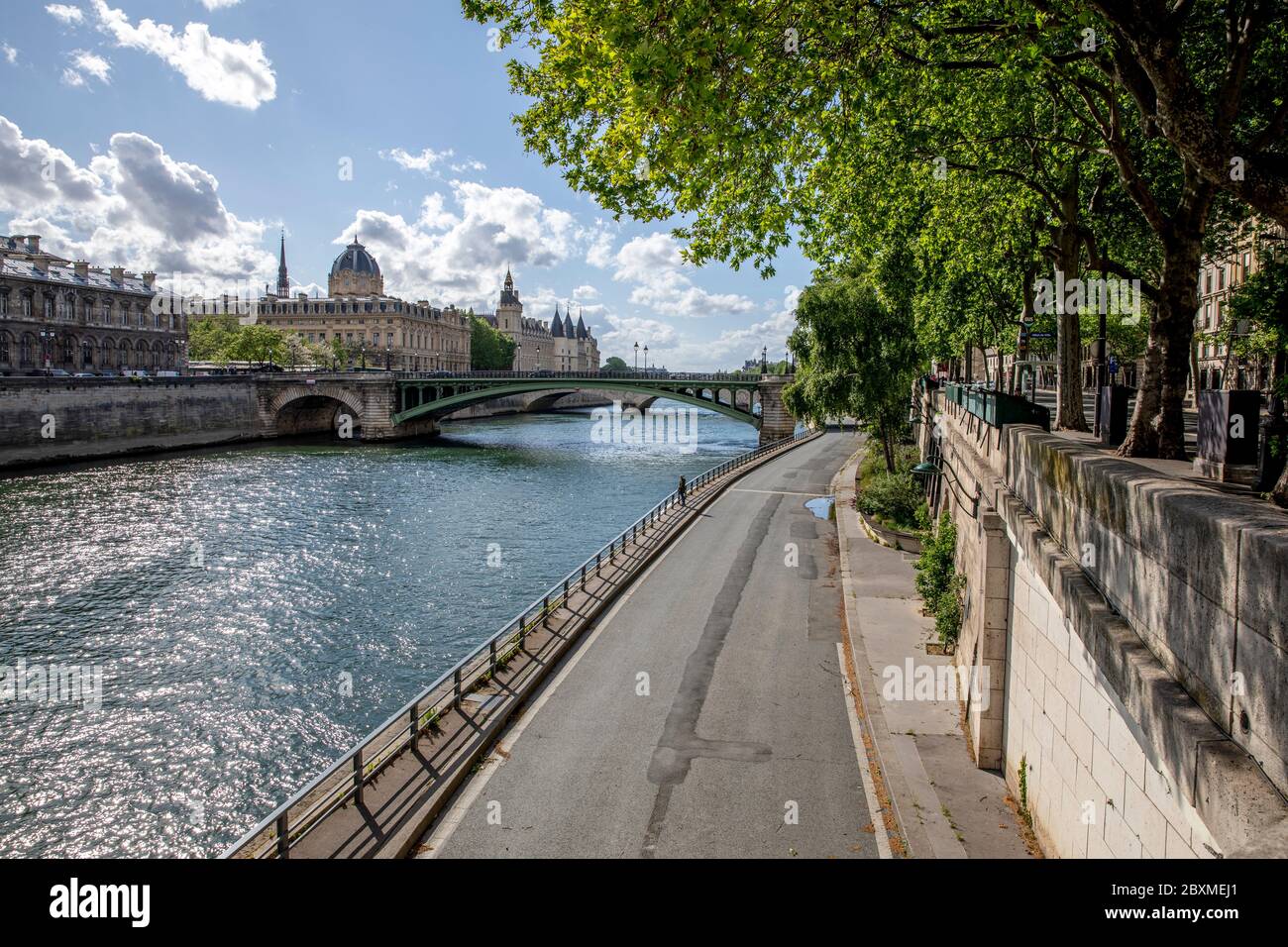 Paris, France - May 1, 2020: View of the Conciergerie, the Hotel Dieu and the bridges over the Seine during the containment measures due to the corona Stock Photo