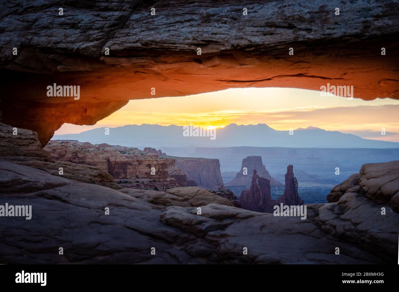 Sunrise at Mesa Arch in Island in the Sky, Canyonlands National Park Stock Photo