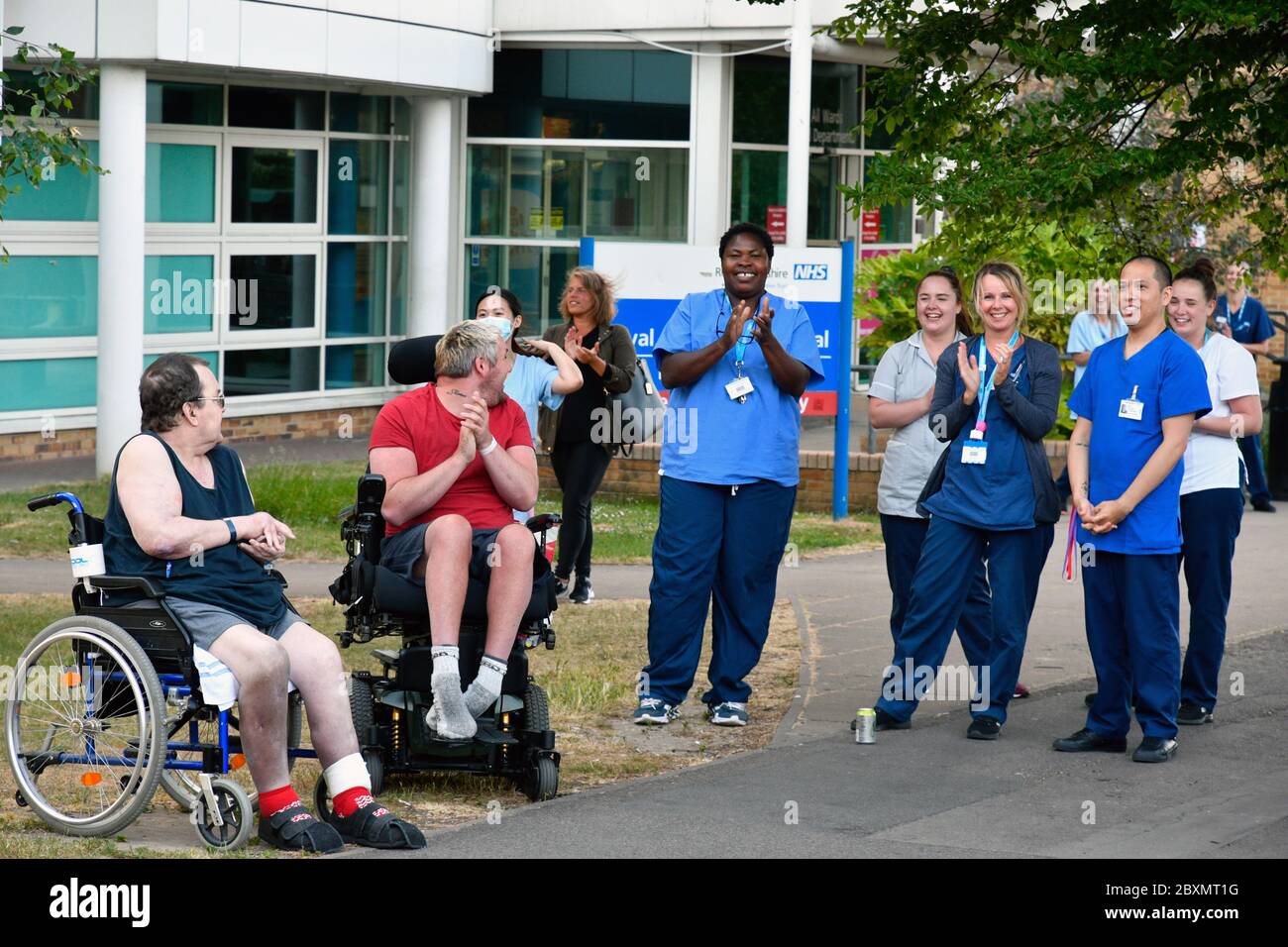 Nurses & patients at Thursday 8pm clap for carers during Coronavirus lockdown, Royal Berkshire Hospital, UK May 2020 Stock Photo