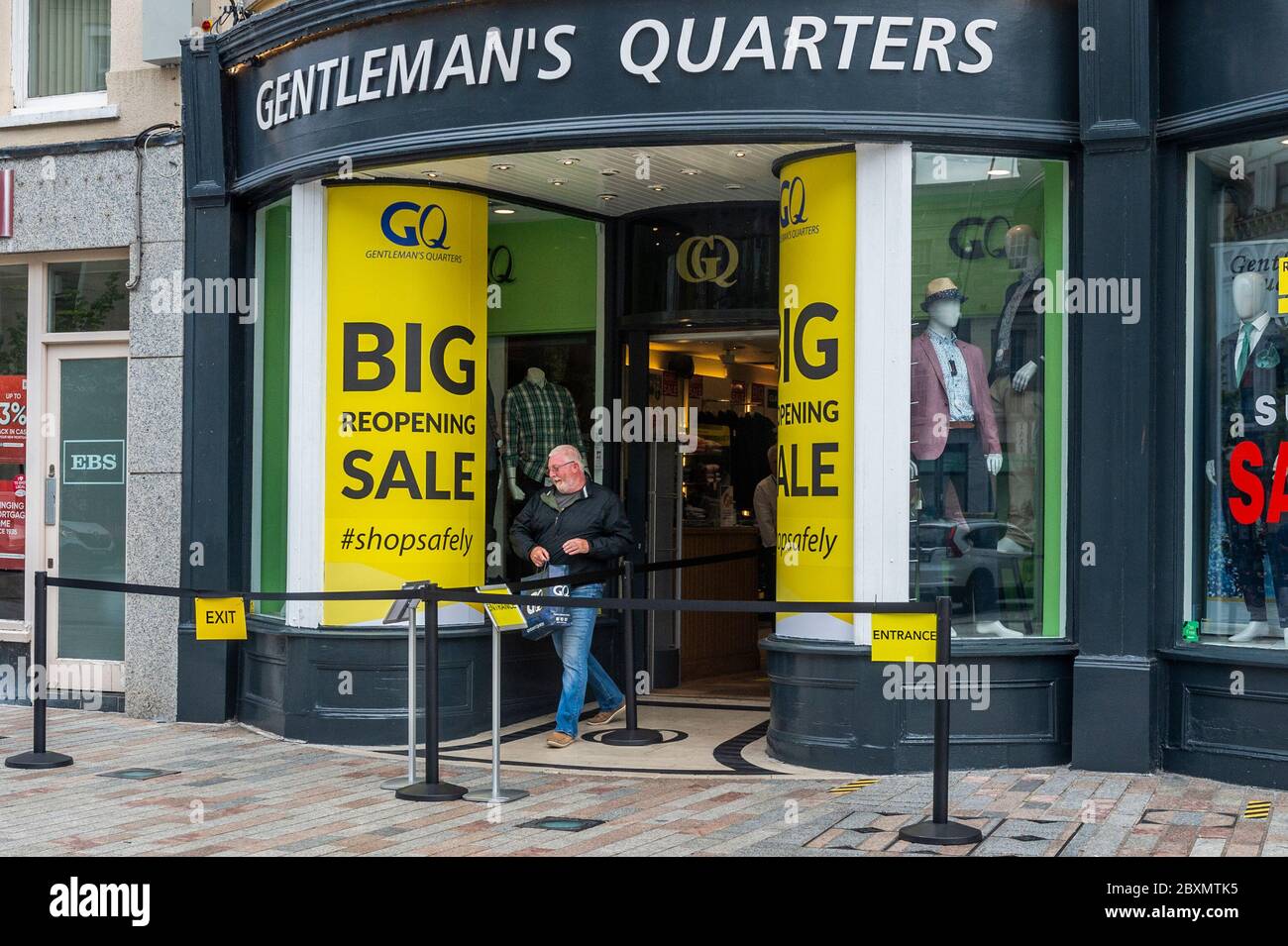 Cork, Ireland. 8th June, 2020. Many shops in Ireland are re-opening today after a 3 month closure due to the Covid-19 pandemic. A man leaves clothes shop Gentleman's Quarters in Patrick Street, Cork. Credit: AG News/Alamy Live News Stock Photo